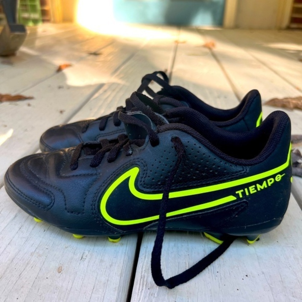 Nike Kids Black Soccer Cleats with Neon Yellow Swoosh